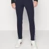 Michael Kors TAPE TRACKPANT - Pantalones Deportivos - Dark Midnight, Hombre -Ofertas Michael Kors Tienda 80145b6acdb74ee0933038f530840a09